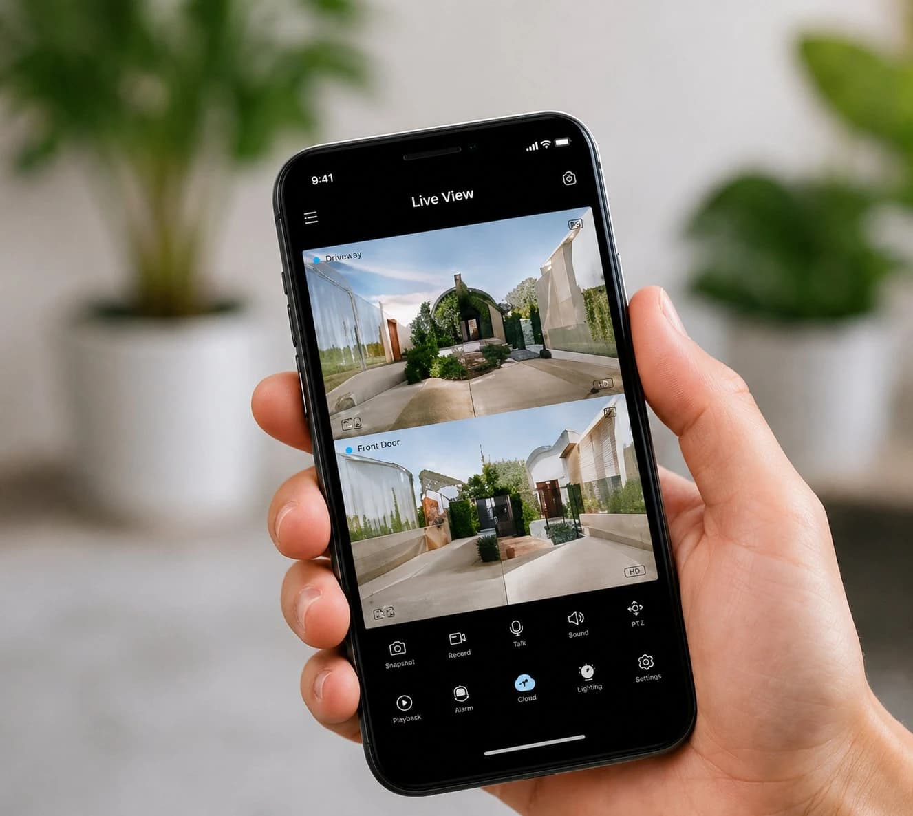Phone showing security camera live view from outside the home