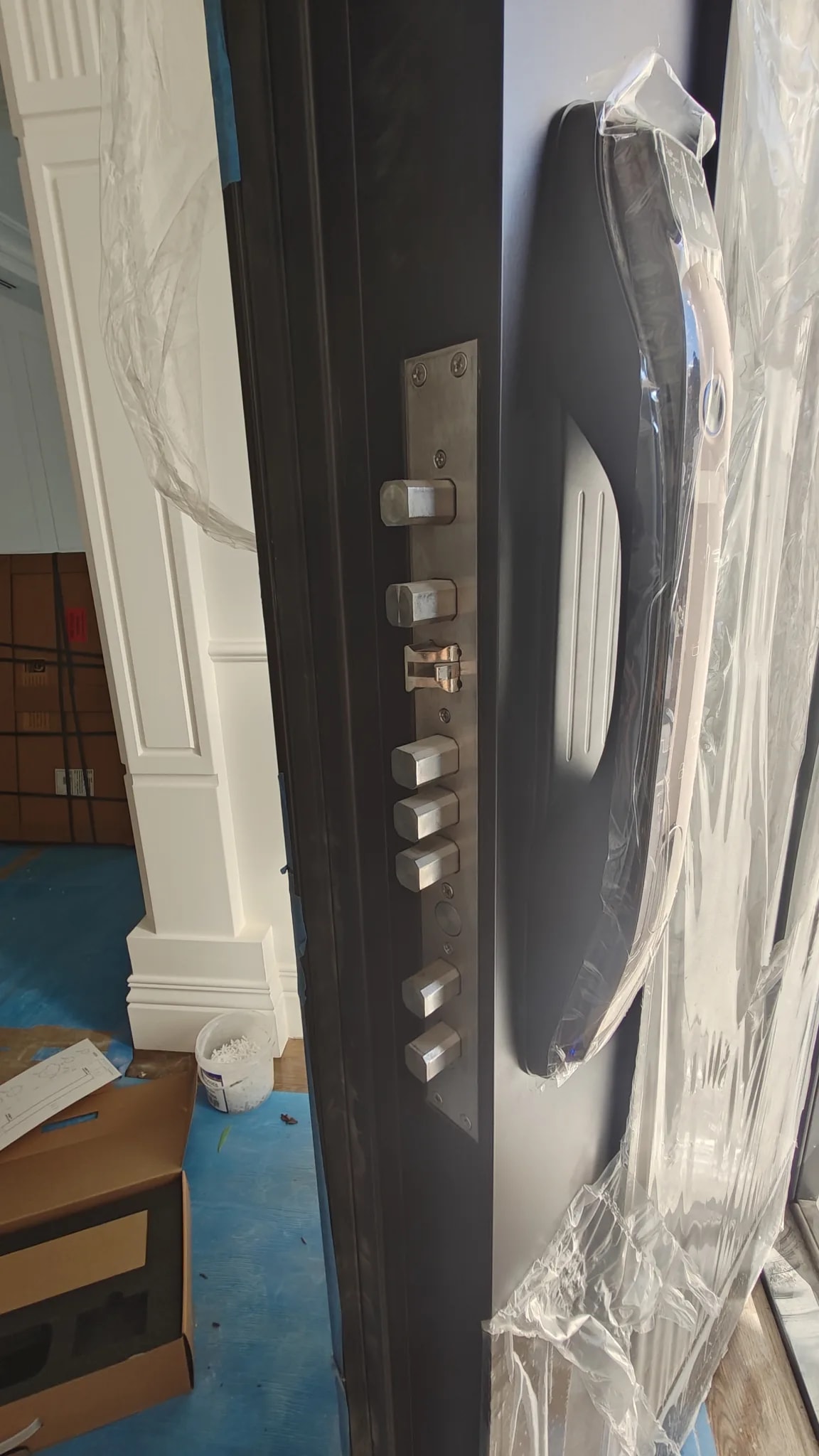 Multi-point front door locking hardware in Balwyn smart home project