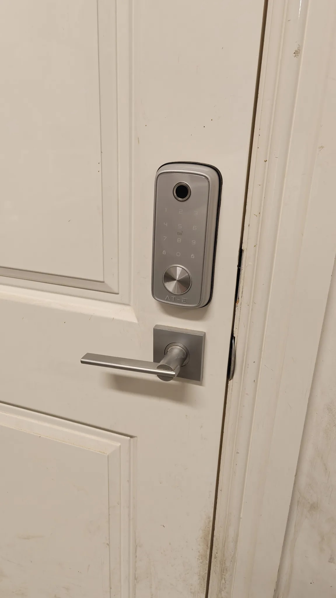 Smart door lock installed on existing residential door