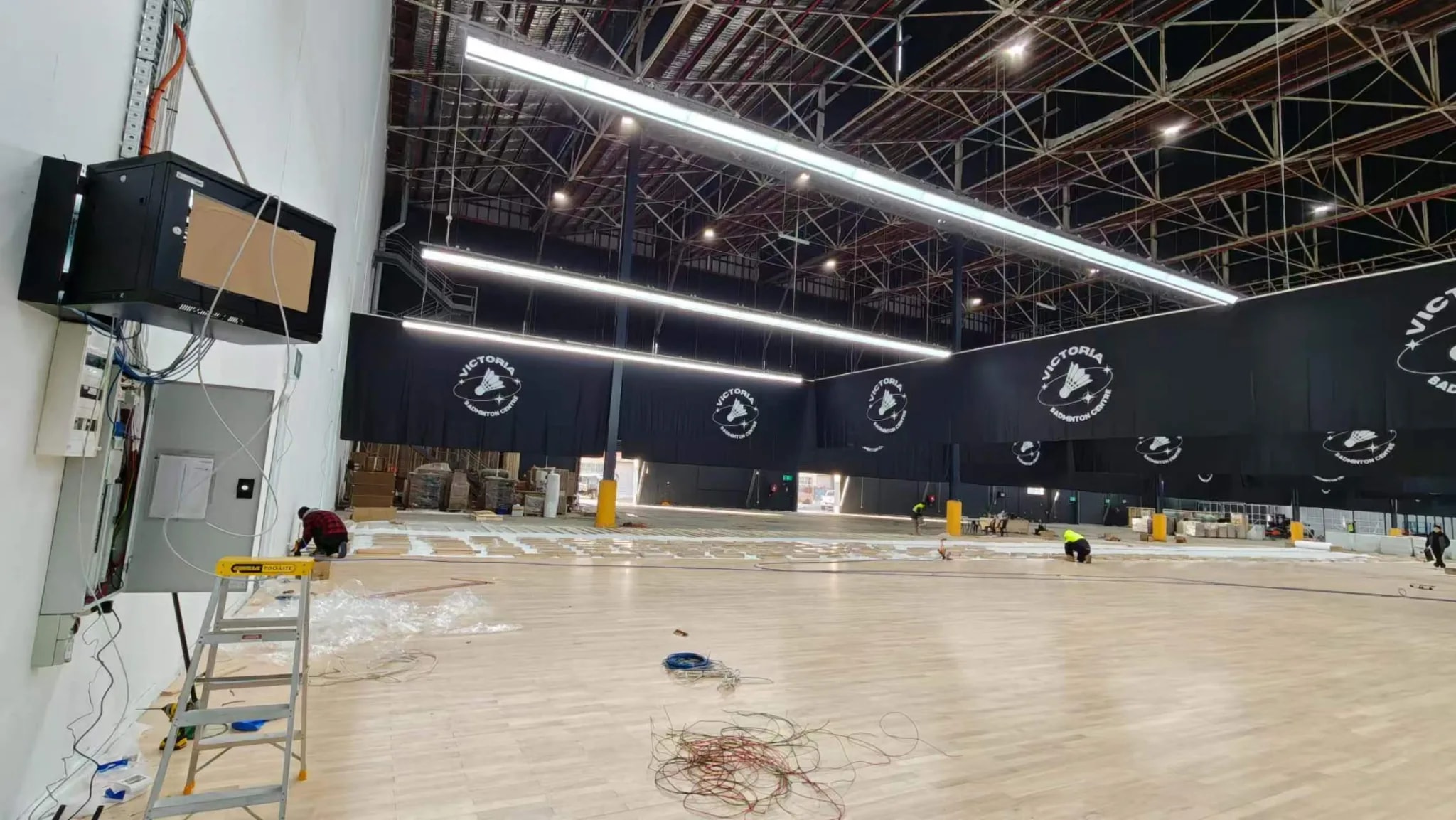 Commercial sports lighting installation for indoor badminton courts